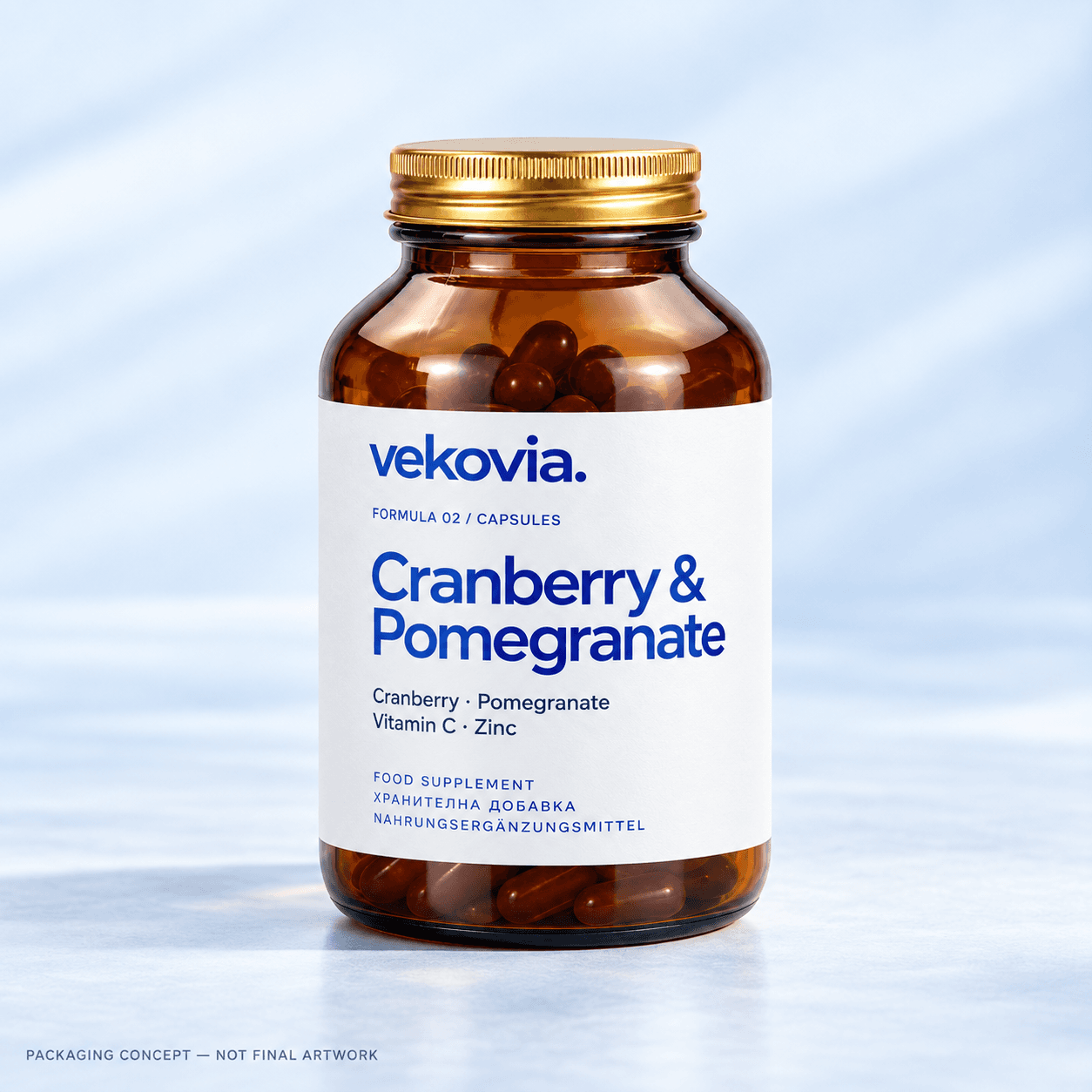 Cranberry & Pomegranate — amber-glass bottle illustration with a gold cap